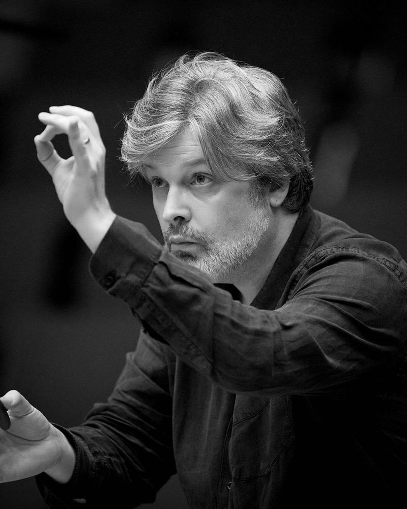 black and white photo of james macmillan conducting 
